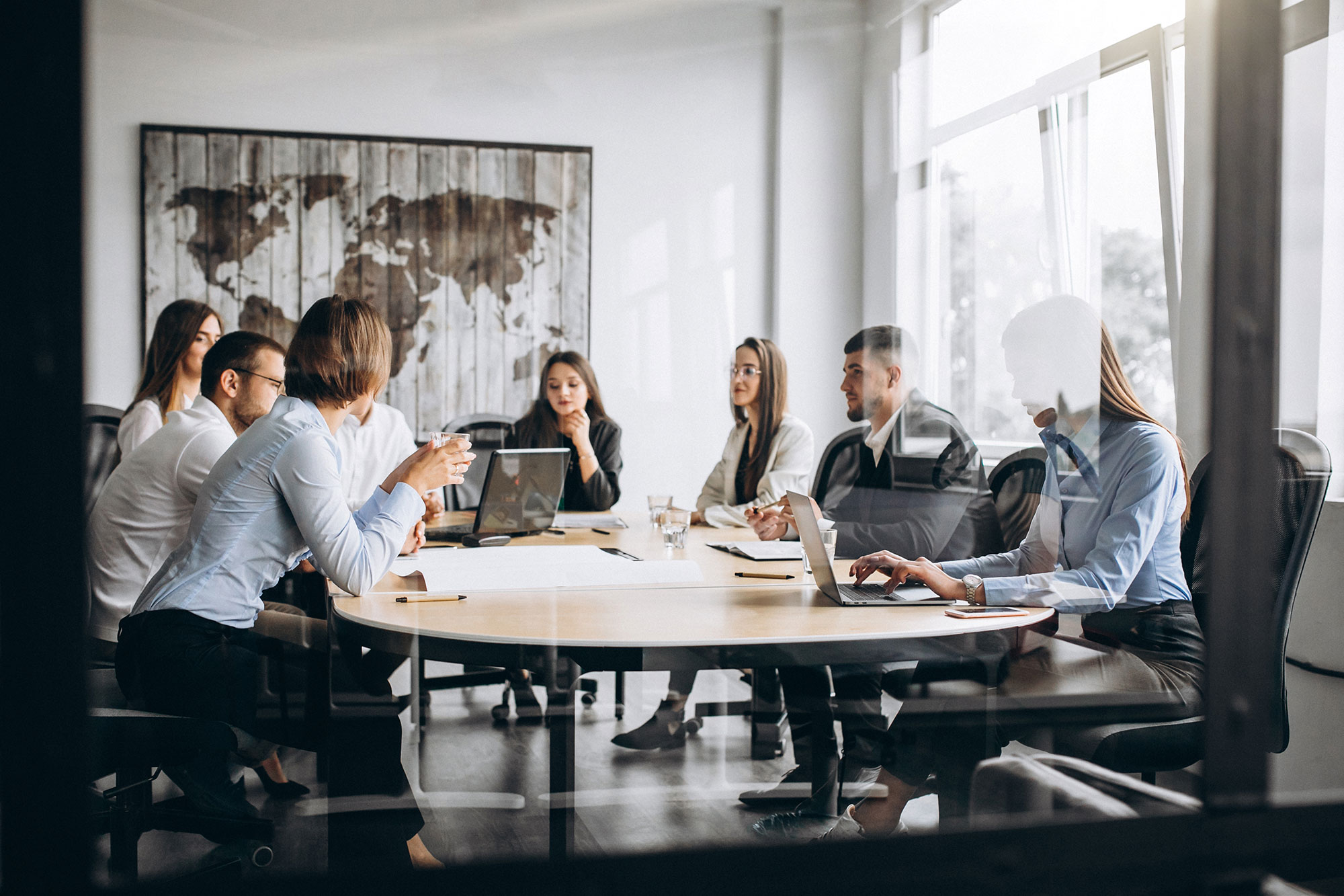 group-of-people-working-out-business-plan-in-an-office